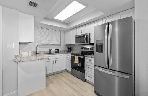 New Smyrna Beach House | Updated Ground Floor OceanFront Condo, Walk to Flagler Ave