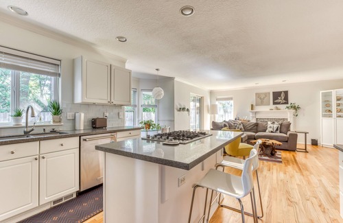 Raleigh Hills House | Updated home next to a park with fenced yard, deck, grill, & W/D