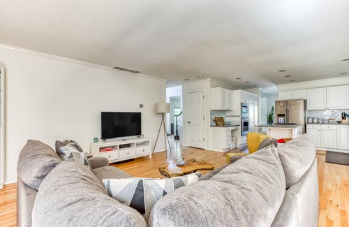 Raleigh Hills House | Updated home next to a park with fenced yard, deck, grill, & W/D