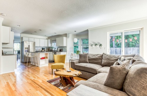 Raleigh Hills House | Updated home next to a park with fenced yard, deck, grill, & W/D