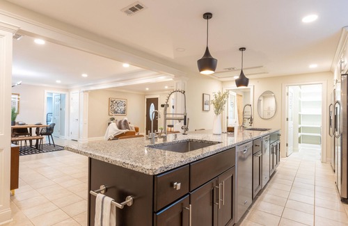 Charlotte House | Updated home with chef's kitchen, open floorplan, and large yard