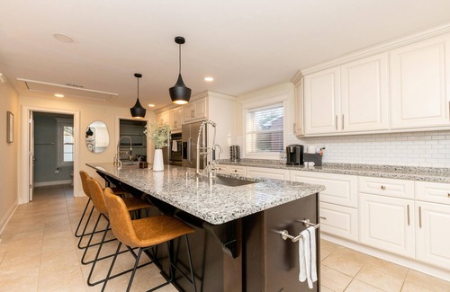 Charlotte House | Updated home with chef's kitchen, open floorplan, and large yard