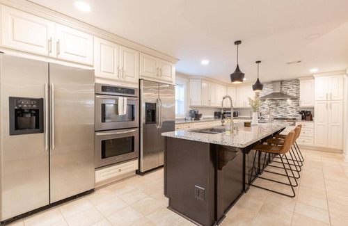 Charlotte House | Updated home with chef's kitchen, open floorplan, and large yard