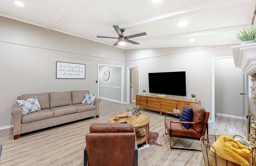Lilburn House | Updated home with movie room, bar, entertainment space, Ping-Pong, & 2 kitchens