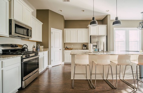 Greer House | Upscale Art-Filled Home By Lake Robinson