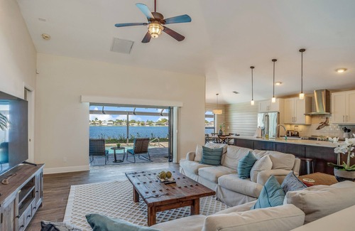 Eight Lakes House | Upscale lakefront home w/private saltwater pool, dock, free WiFi, & central AC
