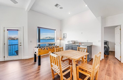 Manson House | Upscale lakefront house with stunning views & dock spacious interior with fireplace