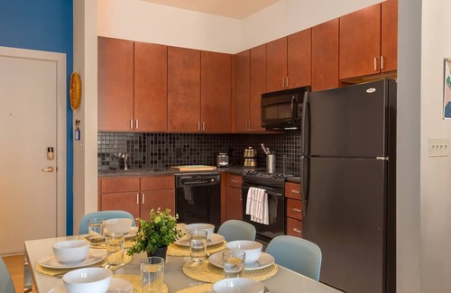 First Ward Apartment | Uptown 1st Ward | Patio with Hammock | 2 Story Apt