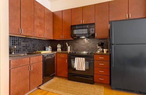 First Ward Apartment | Uptown 1st Ward | Patio with Hammock | 2 Story Apt