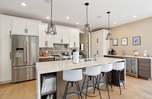 Sunnyside House | Urban Perfection! Modern Home, 2 Primary BRs, hot tub, boccee, game room, patio.