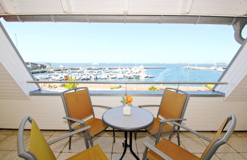 Wiek Apartment | Vacation apartment near the harbor with balcony and sea view - Hafenhäuser Wiek FeWo 01