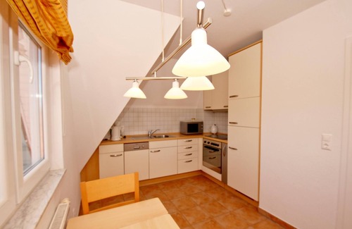 Wiek Apartment | Vacation apartment near the harbor with balcony and sea view - Hafenhäuser Wiek FeWo 04