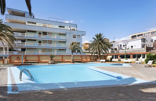 Las Caletillas Apartment | Vacation Apartment 'Arenitas Sunset 1' with Sea View, Shared Pool and Wi-Fi