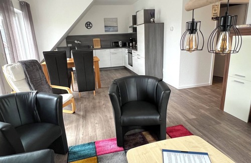 Papenburg Apartment | Vacation apartment "Aurora" Papenburg Large balcony EBK New building 74 sqm Free Wifi 2 bedrooms
