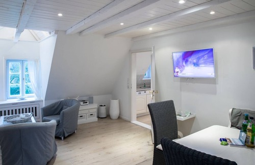 Wrixum Apartment | Vacation apartment Silbermöwe- Herrenhof Wrixum - Vacation in the historic