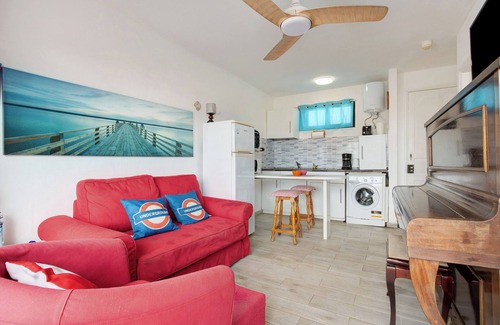 Corralejo Apartment | Vacation Apartment 'Dunes To Explore and Relax' with Shared Pool, Private Terrace and Wi-Fi