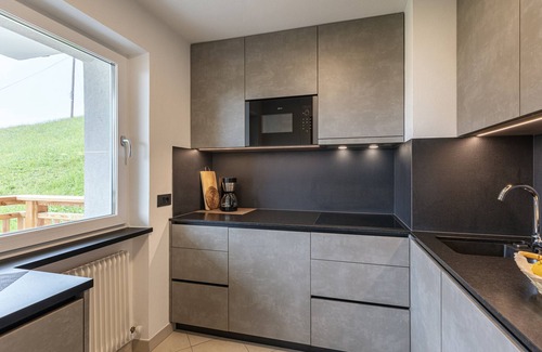 Santa Cristina Val Gardena Apartment | Vacation Apartment "Comfort2 La Mana" with Mountain View, Wi-Fi & Garden