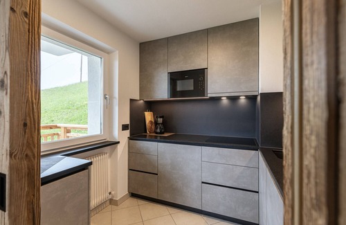 Santa Cristina Val Gardena Apartment | Vacation Apartment "Comfort2 La Mana" with Mountain View, Wi-Fi & Garden