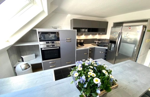 Langeoog Apartment | Vacation apartment -JAKOB- in the vacation domicile "PaPaJa" on the upper floor with a large roof terrace.