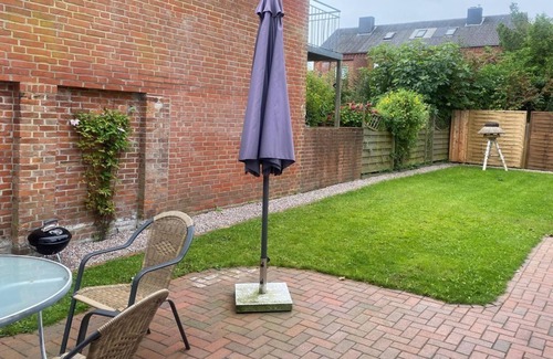 Toenning House | Vacation apartment "Jule" OG - Stadthaus Südertraum