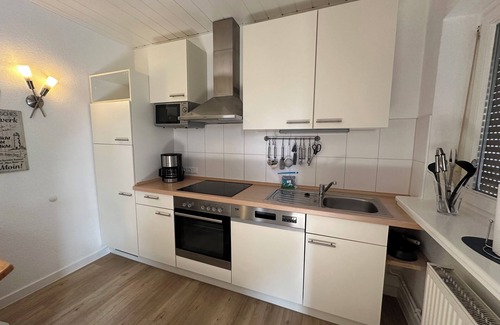 Fehmarn Apartment | Vacation apartment Kleine Sundpfote with large garden.