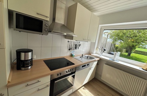 Fehmarn Apartment | Vacation apartment Kleine Sundpfote with large garden.