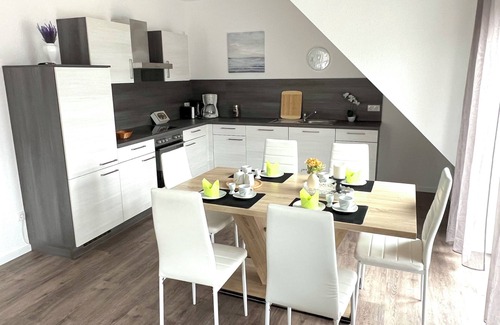Papenburg Apartment | Vacation apartment "Nautilus" Papenburg roof terrace EBK new building 74 sqm Free Wifi 2 bedrooms