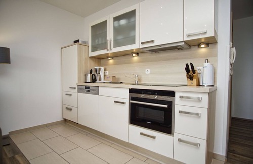 Lauterbach Apartment | Vacation apartment near the harbor with sea view - Hafenresidenz Lauterbach FeWo 2-2 -