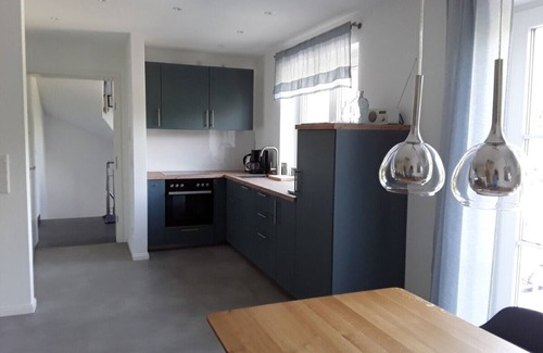 Toenning Apartment | Vacation apartment "Norderhus" (WH2) with 70sqm - quiet central location - with balcony