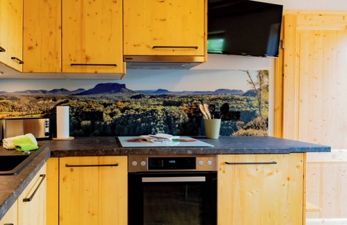 Bastei Apartment | Vacation apartment with balcony - unique view of the rocky world of Rathen