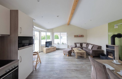 Dorumer Neufeld House | Vacation home Mellumplate 5, at ground level and surrounded by greenery.
