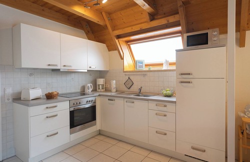 Dorumer Neufeld House | Vacation home North Sea breeze. Picturesque and with a sun terrace.
