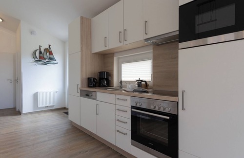 Dorumer Neufeld House | Vacation home Wattkrabbe. Charming and inviting.