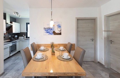Dorumer Neufeld House | Vacation home Möwennest. With sun terrace and at ground level.