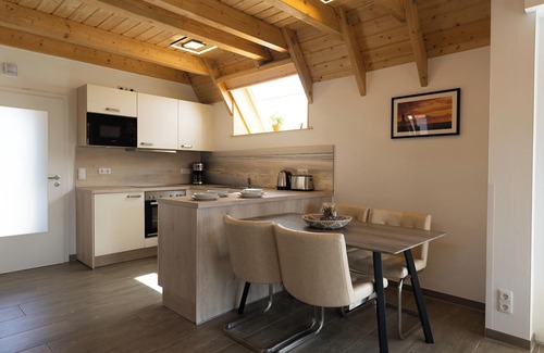 Dorumer Neufeld House | Vacation home Wattwurm. Inviting and with a sun terrace.