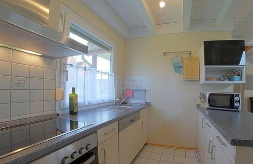 Dorumer Neufeld House | Vacation home "Buß" on the North Sea coast, vacation directly behind the dike!