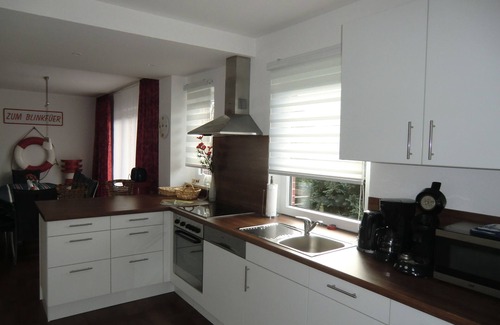 Nordseebad Burhave House | Vacation home Zum Leuchtturm in the middle of Burhave, large living area and garden