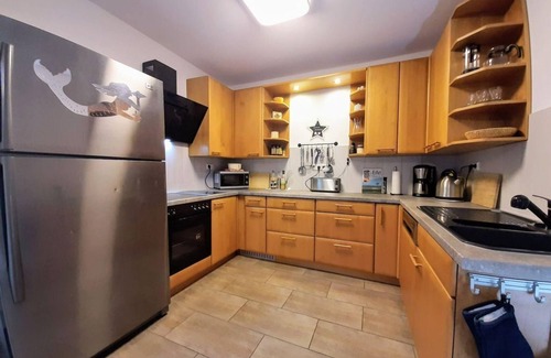 Zweifelscheid House | Vacation home Atrium (up to 16 persons) - South Eifel family and group vacation homes