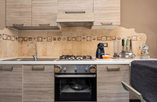 Budoni House | Vacation Home "Casa a Schiera Budoni" with Terrace & Garden