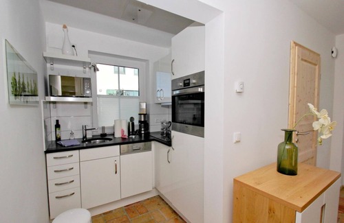 Gager House | Vacation home Falke - chic vacation home with sea view, terrace and fireplace -