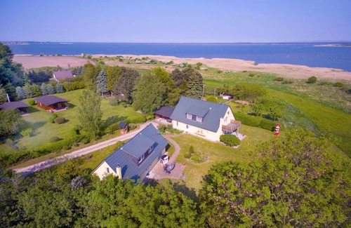Kammin House | Vacation home Kormoran - close to the water in a quiet location, own garden and terrace