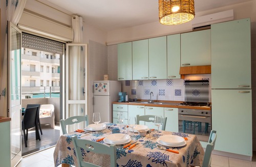 Rivabella House | Vacation Home 'Pineta Mare Flat' with Sea View, A/C & Private Terrace