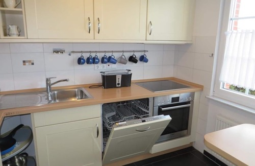 Westeraccumersiel House | Vacation home Seeadler 750 meters to the beach Wheelchair accessible.