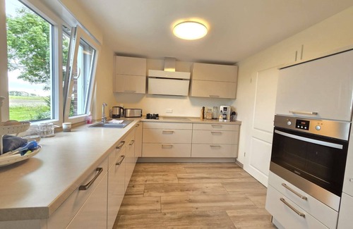 Dornum House | Vacation home Zuhause am Deich Neßmersiel - Welcome to your home on the dike!