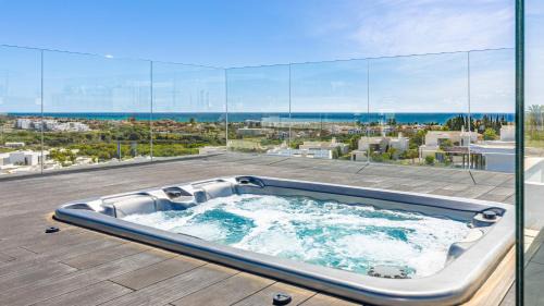 New Golden Mile Villa | VACATION MARBELLA I Villa Martinica, Turquoise Heated Pool, Rooftop Hot Tub with Sea View, Cine Room, 5 min to the Beach