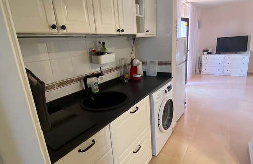 Corralejo Apartment | Vacation 'Oasis Duna Casa Martineli' with Shared Pool, Balcony and Wi-Fi