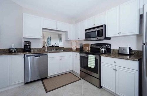 North Naples Condo | Vacation Paradise at "Sunset Tides " Emerald Lakes in North Naples!