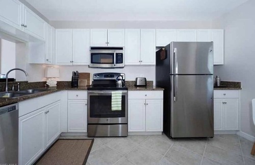 North Naples Condo | Vacation Paradise at "Sunset Tides " Emerald Lakes in North Naples!