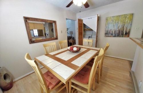 Red River House | Valley Condo 126 - Creekside - WiFi - Hot Tub - Fireplace - Washer - Dryer - Playground