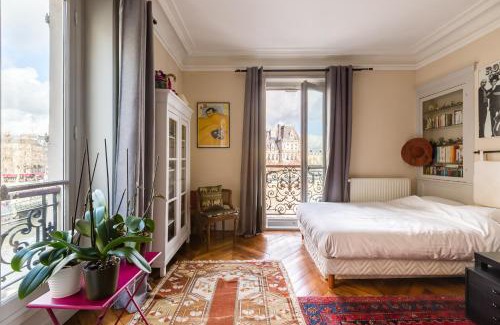 Les Iles Apartment | Veeve - Overlooking the Seine on Ile de la Cité